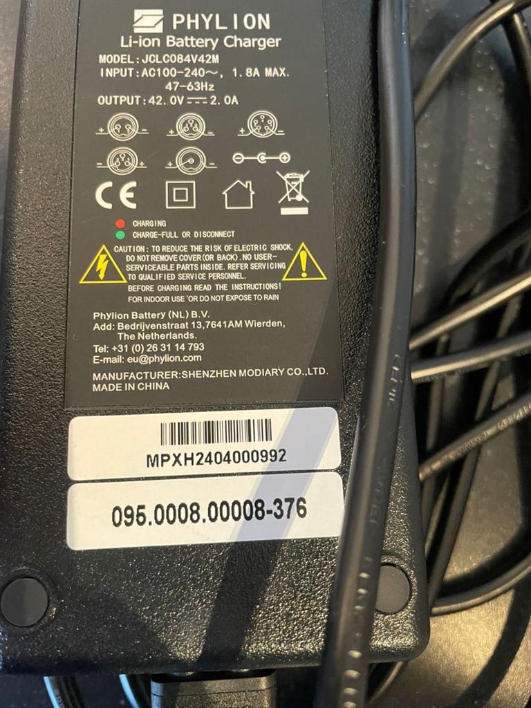Te Koop: acculader voor elektrische fiets., Fietsen en Brommers, Ophalen of Verzenden, Zo goed als nieuw