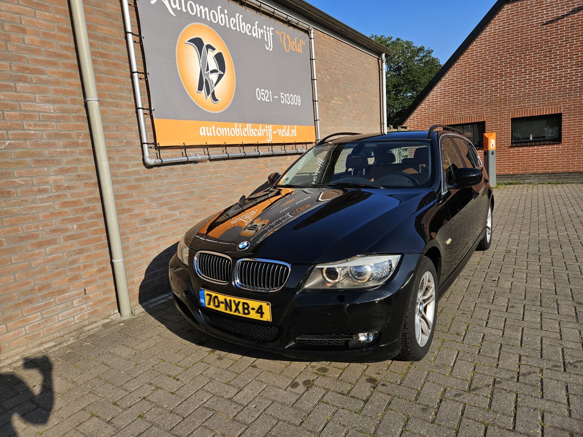 BMW 3 Serie Touring 318i Business Line (bj 2010), Euro 5, Achterwielaandrijving, Zwart, Handgeschakeld