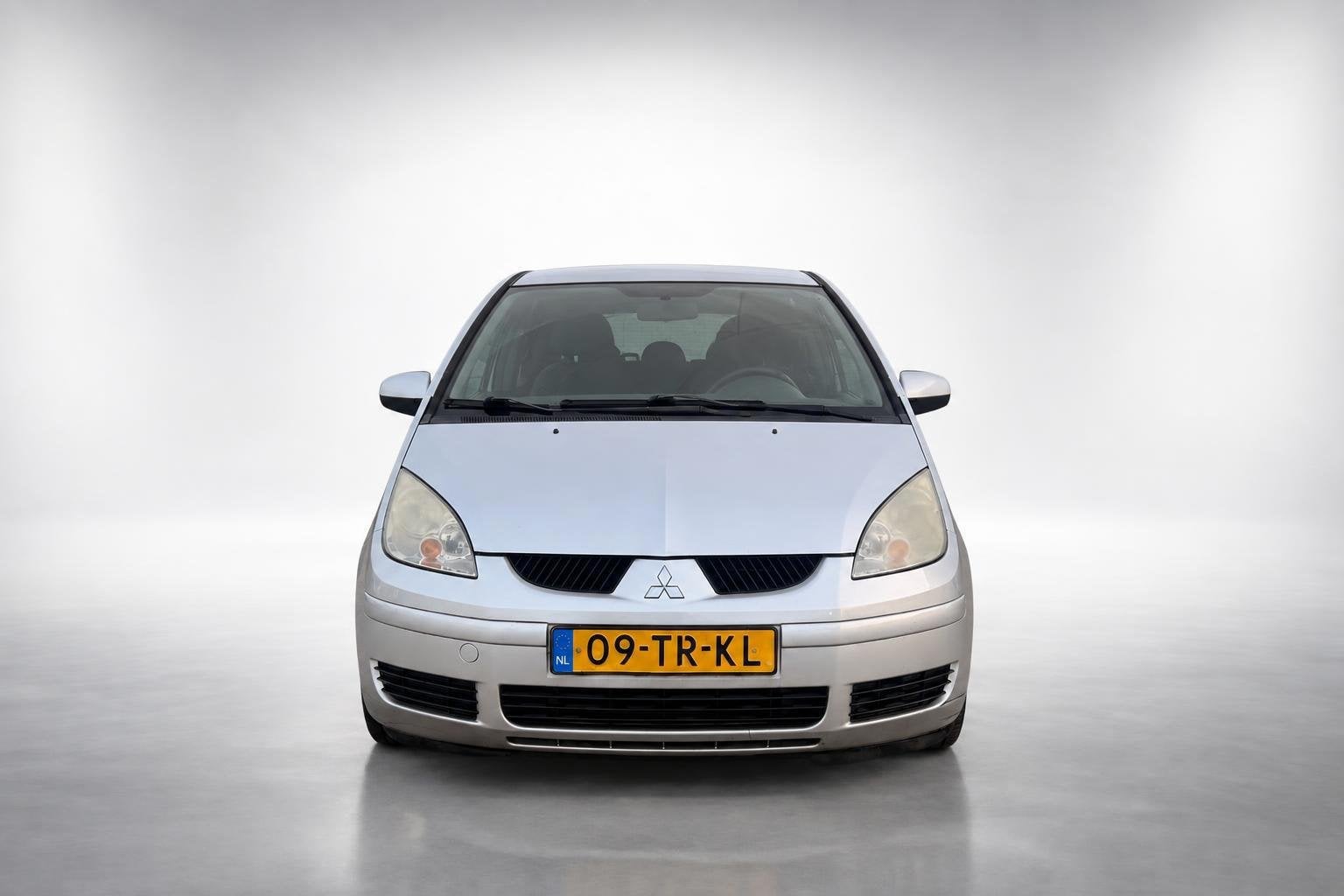 Mitsubishi Colt 1.3 Invite|airco|jaar APK, Auto's, Gebruikt, 31 €/maand, Verwarmde buitenspiegels, Colt