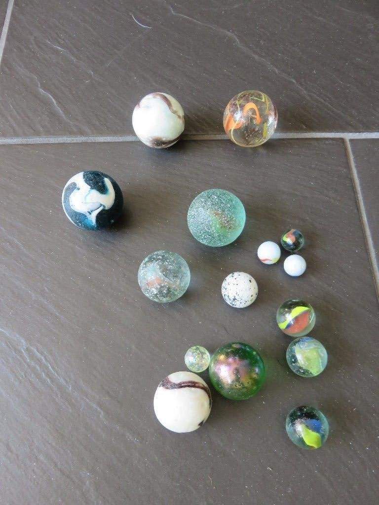 Knikkers set van 15stuks, 1,5-4cm groot. Set is netjes, Kinderen en Baby's, Speelgoed | Buiten | Los speelgoed, Ophalen of Verzenden