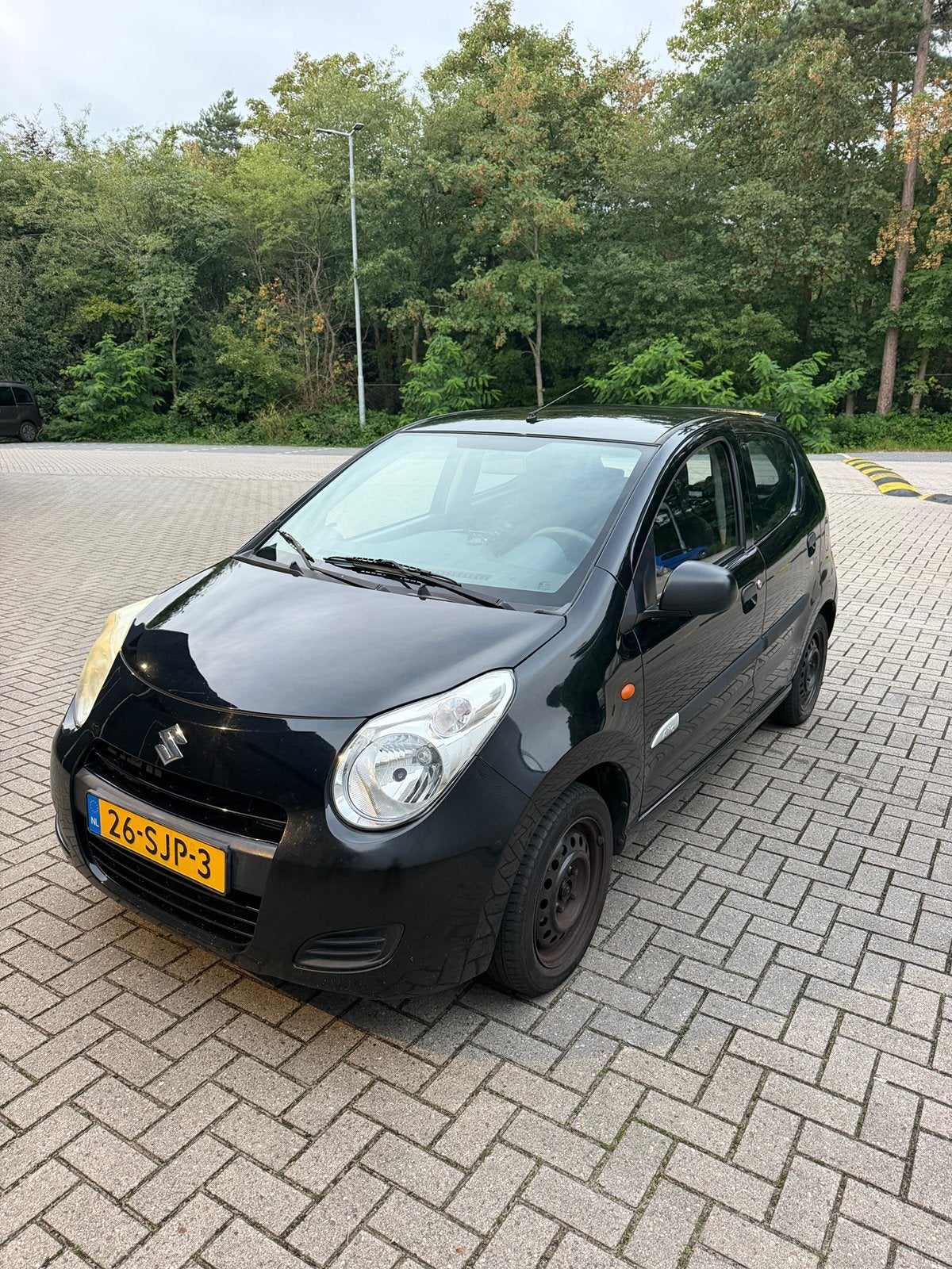 Suzuki Alto 1.0 2011 Zwart, Auto's, Voorwielaandrijving, 200 kg, 4 stoelen, Origineel Nederlands