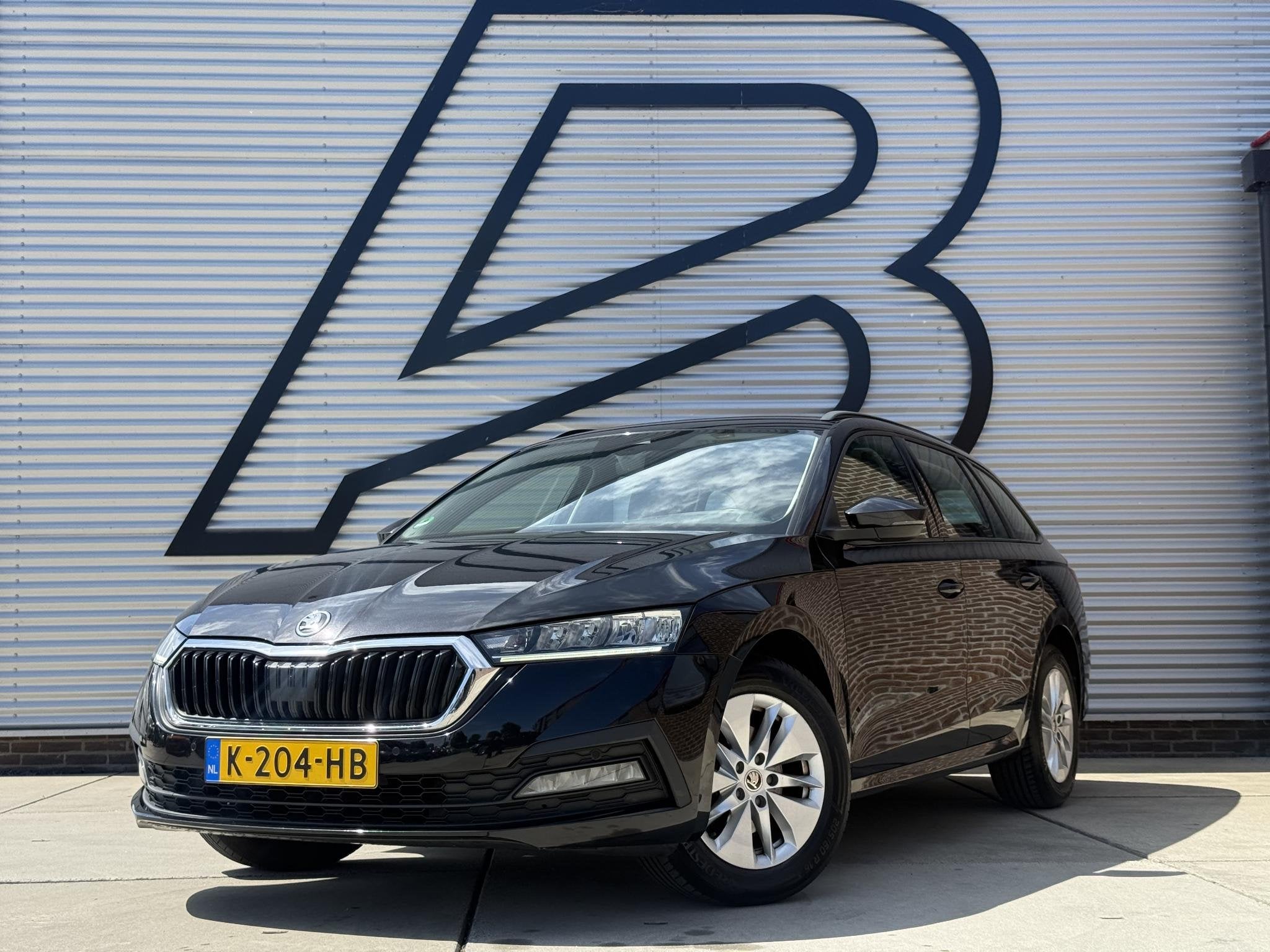 Skoda Octavia Combi 1.0 TSI Business Edition 2e Eigenaar|Cli, Auto's, Stof, Gebruikt, Zwart, Origineel Nederlands