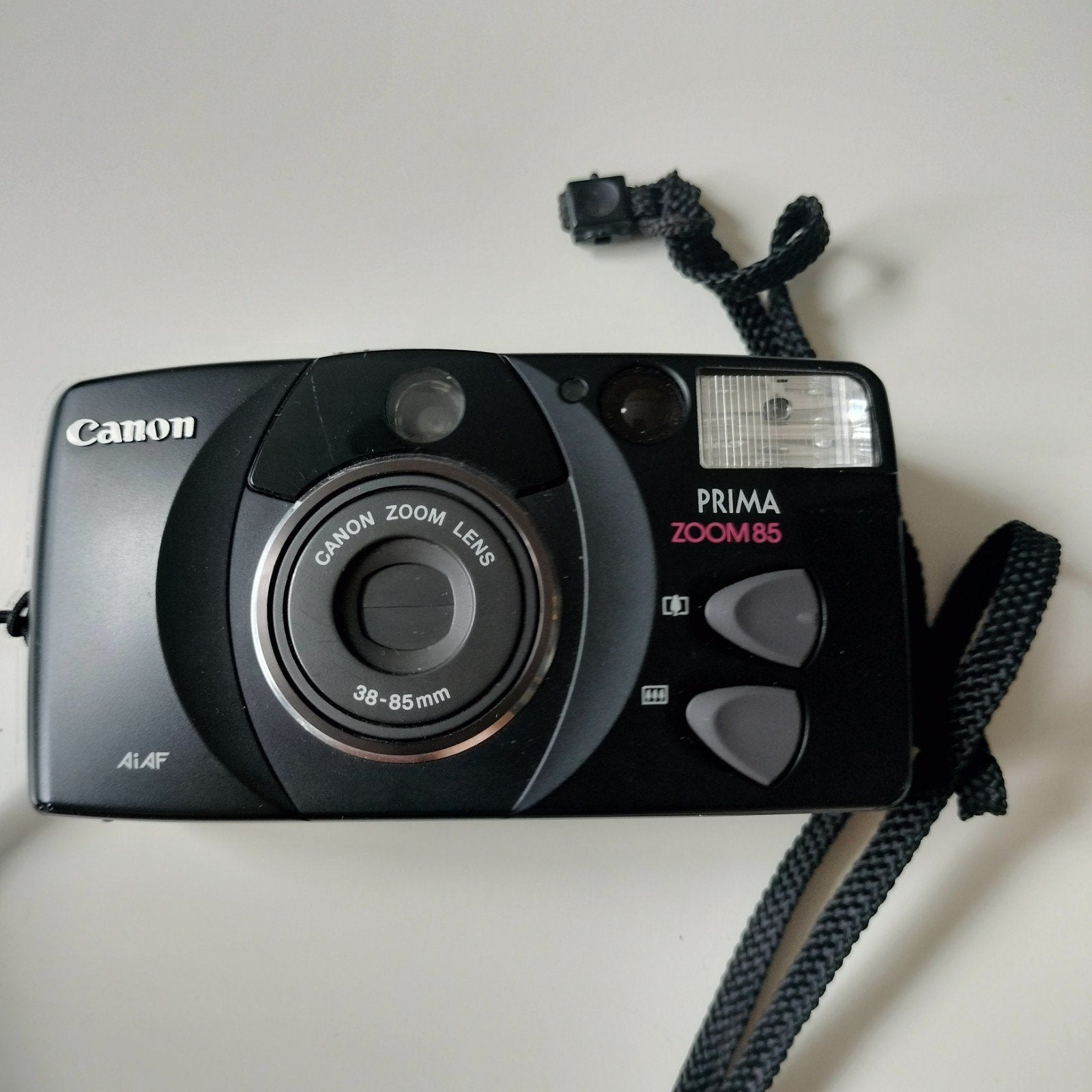 Canon Prima zoom 85  lens 38-85mm  zoom85, Ophalen of Verzenden, Zo goed als nieuw, Compact, Canon