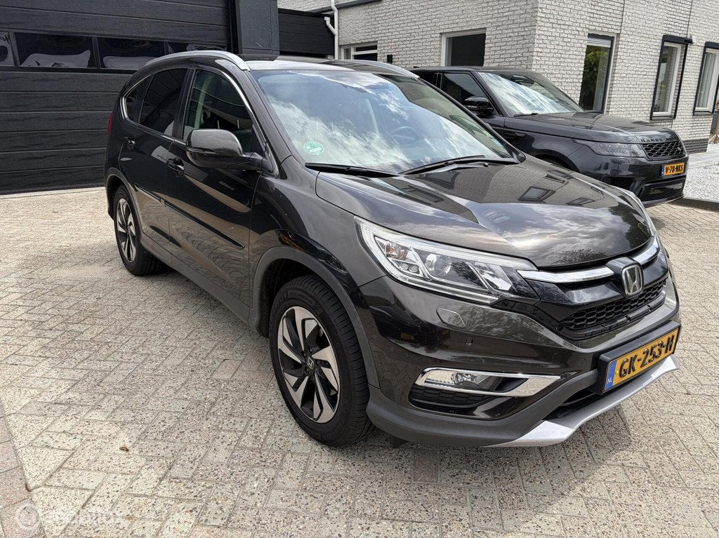 Honda CR-V 1.6D 4WD Executive AUTOMAAT / LEER / PANORAMADAK, Auto's, Honda, Automaat, Gebruikt, Euro 6, Bruin