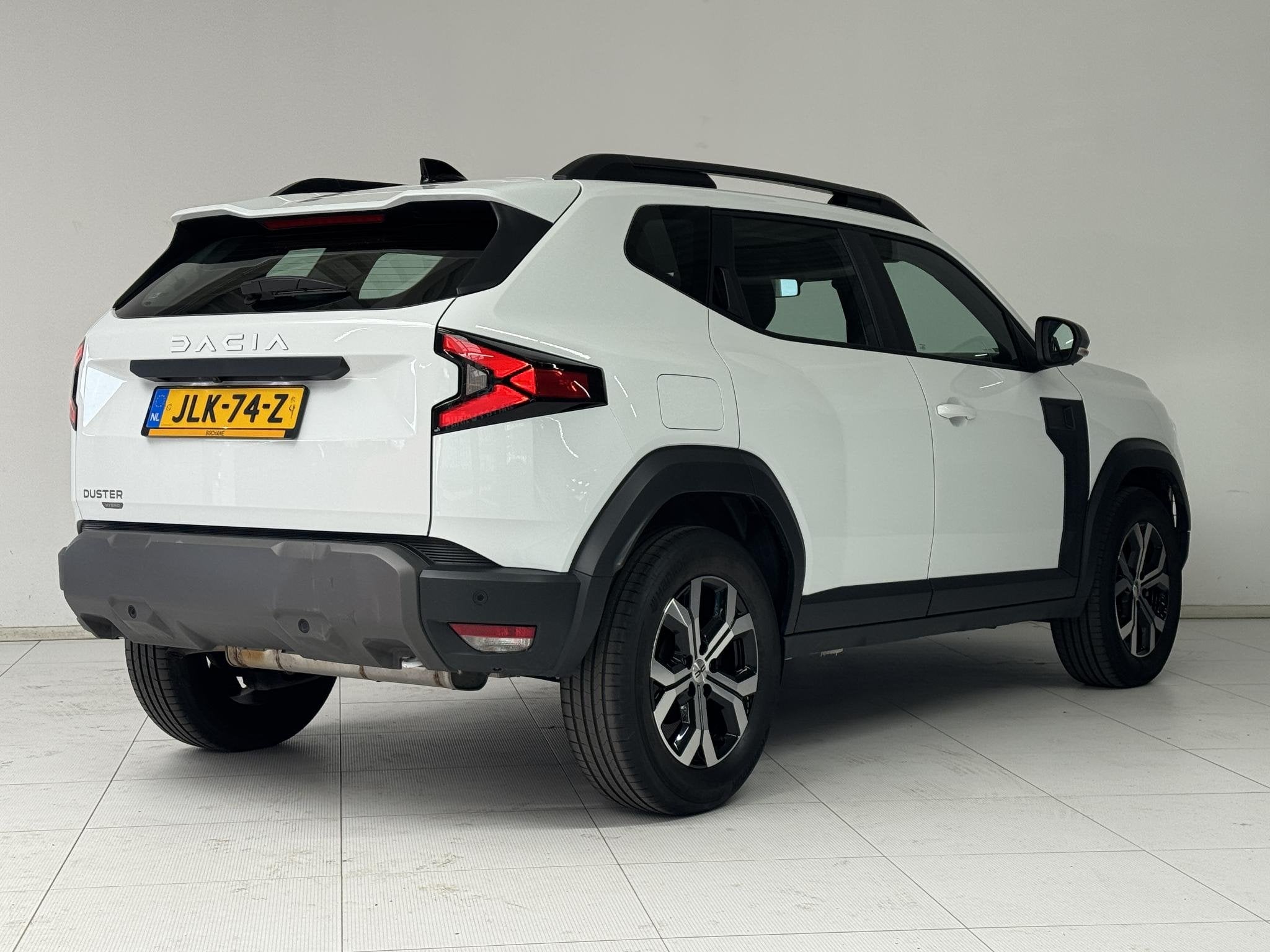 Dacia Duster 1.6 Hybrid 140 Expression | Apple CarPlay / And, Auto's, Dacia, Stof, Gebruikt, 4 cilinders, Wit