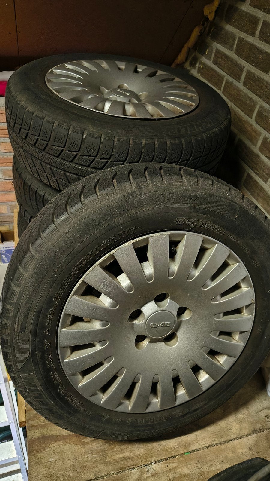 Winterbanden met velgen - Saab, Ophalen