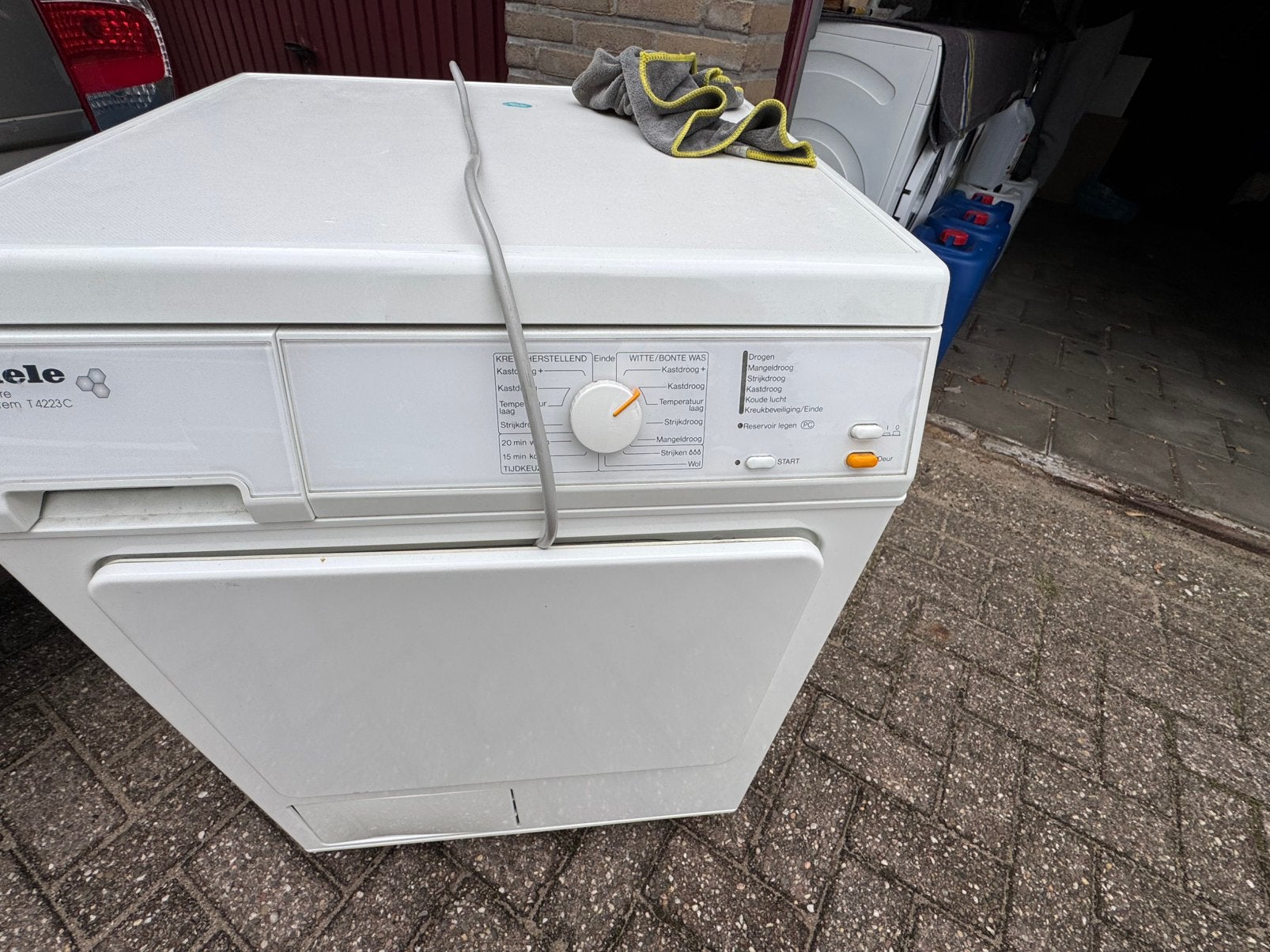 Partij defecte witgoed wasmachine en drogers, Ophalen