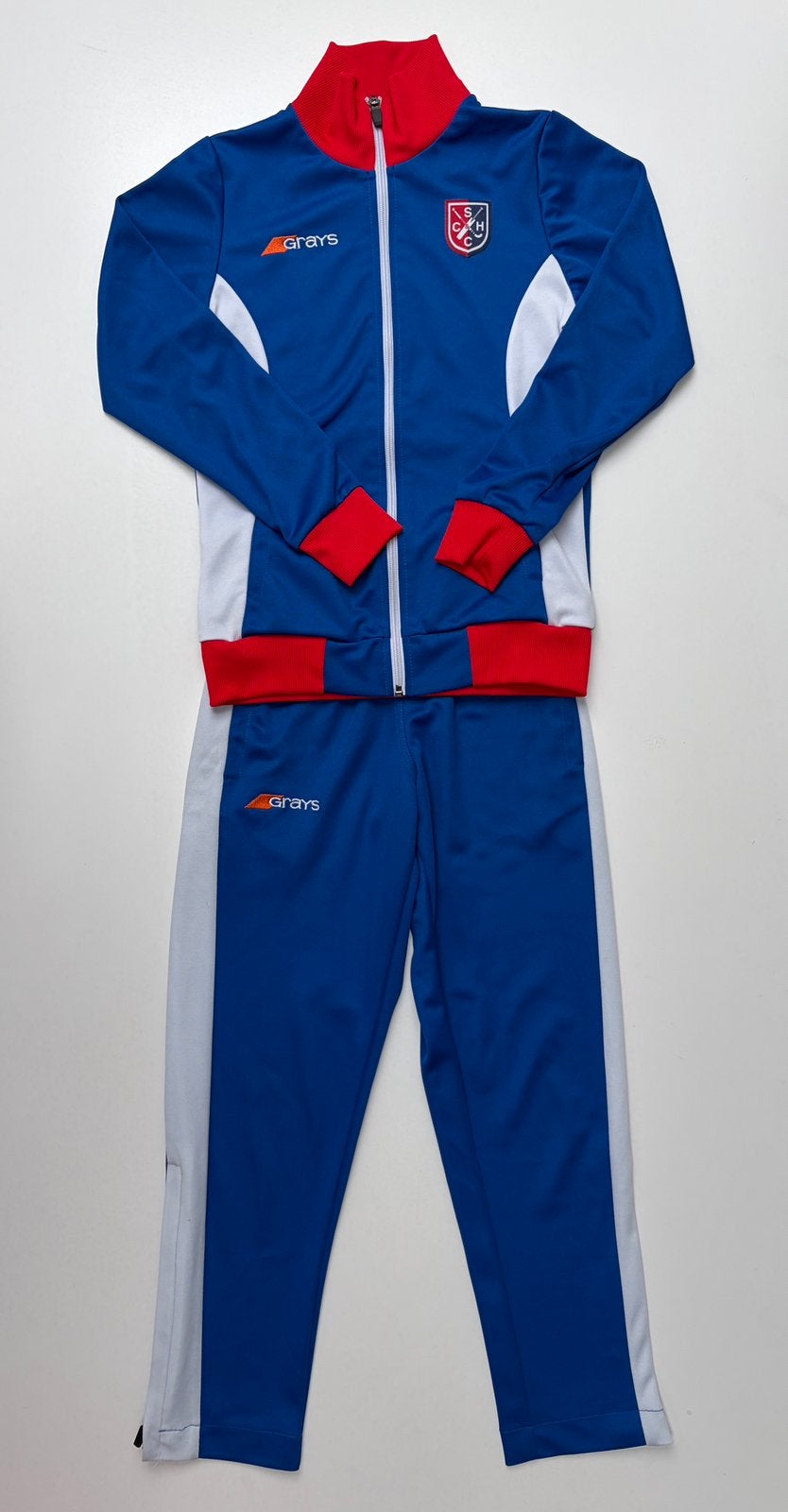 SCHC Trainingspak maat 140/ 152, Ophalen of Verzenden, Zo goed als nieuw, Meisje, Sport- of Zwemkleding