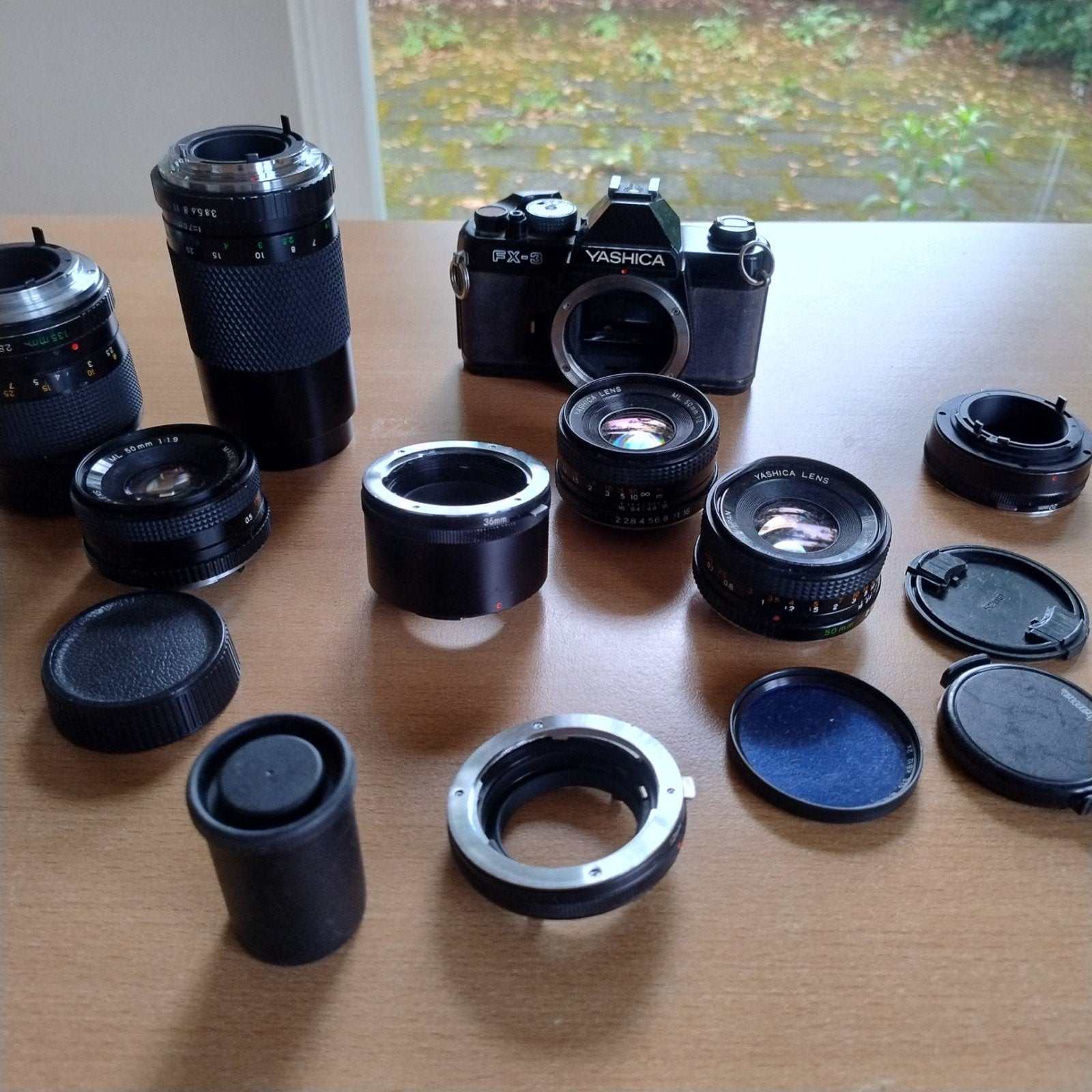 Yashica FX-3 Spiegelreflexcamera met diverse lenzen, Audio, Tv en Foto, Fotografie | Lenzen en Objectieven, Ophalen, Gebruikt