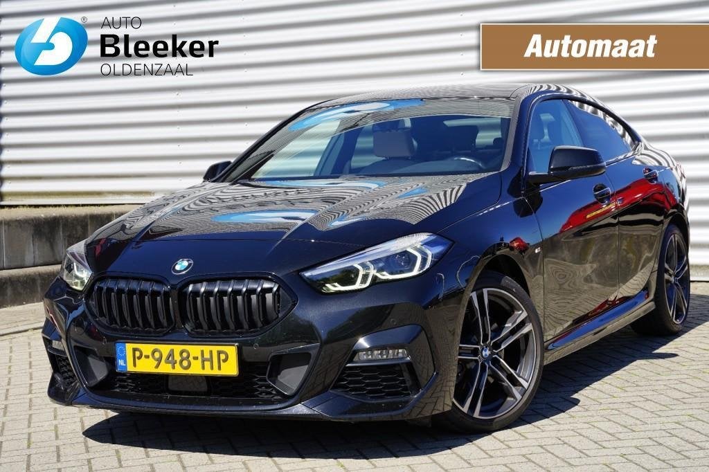 Bmw 2-serie Gran Coupe 218i 136pk Business Edition Plus Aut., Auto's, 136 pk, 1350 kg, Leder en Stof, Zwart