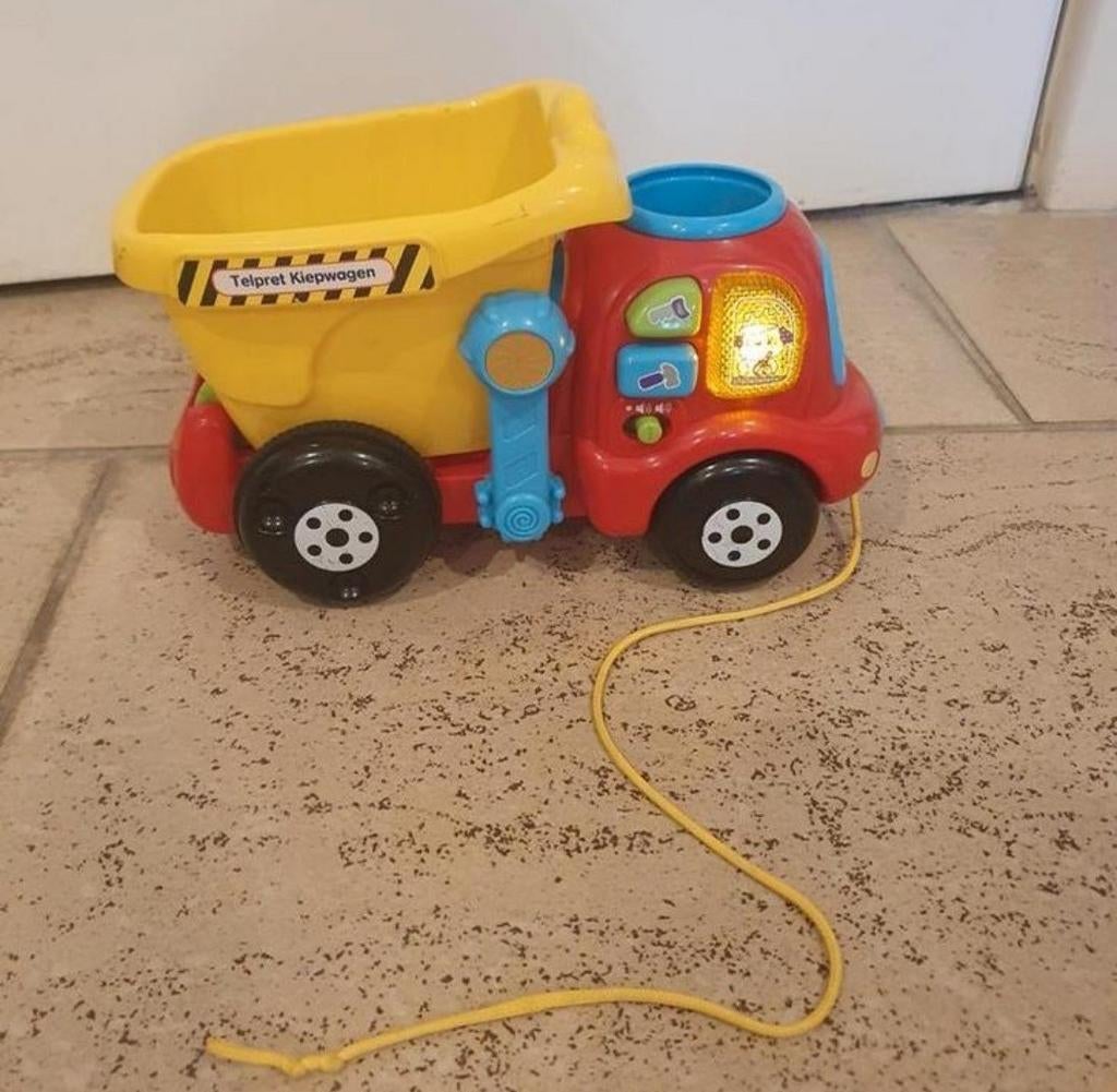 Vtech kiepwagen, telpret. Met geluiden. Muziek,, Ophalen of Verzenden, 6 maanden tot 2 jaar