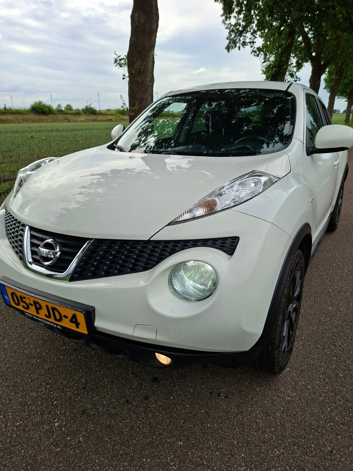 Nissan Juke 1.6 2011 Wit, Auto's, 1250 kg, 4 cilinders, Origineel Nederlands, Handgeschakeld