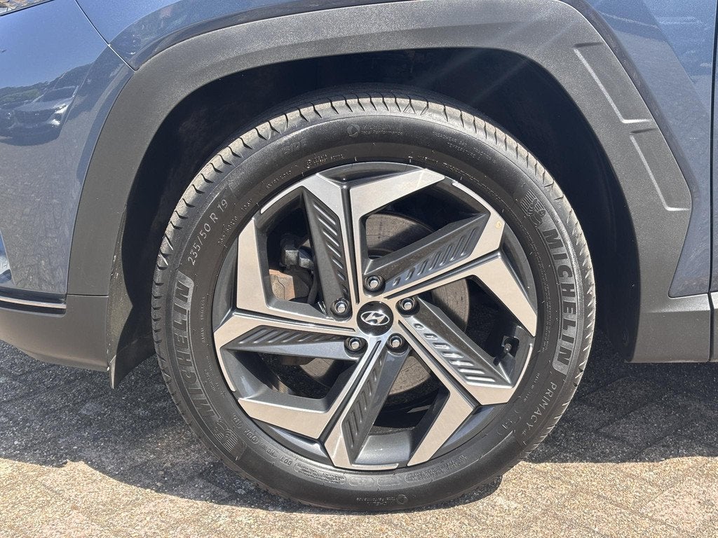 Hyundai Tucson 1.6 T-GDI PHEV Premium 4WD l Panoramadak, Sto, Auto's, Hyundai, Automaat, Lichtsensor, 14 kWh, Gebruikt