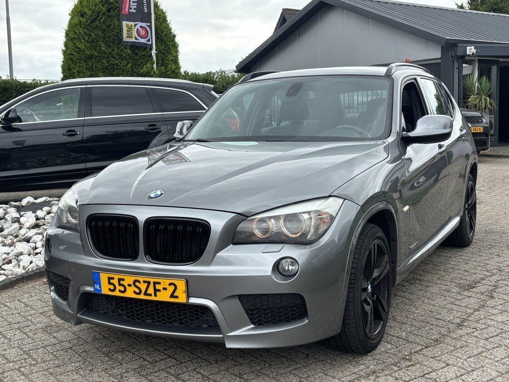 BMW X1 2.0i S-Drive Automaat 2011 NL Auto Trekhaak, Auto's, Euro 5, 4 cilinders, Alcantara, 184 pk