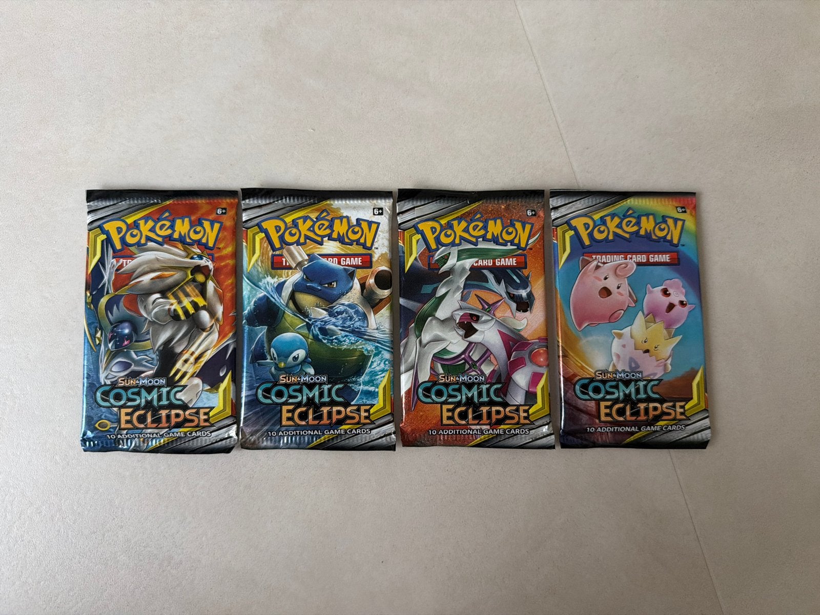 Pokémon Cosmic Eclipse Booster Packs - 4 stuks, Ophalen of Verzenden, Nieuw, Booster