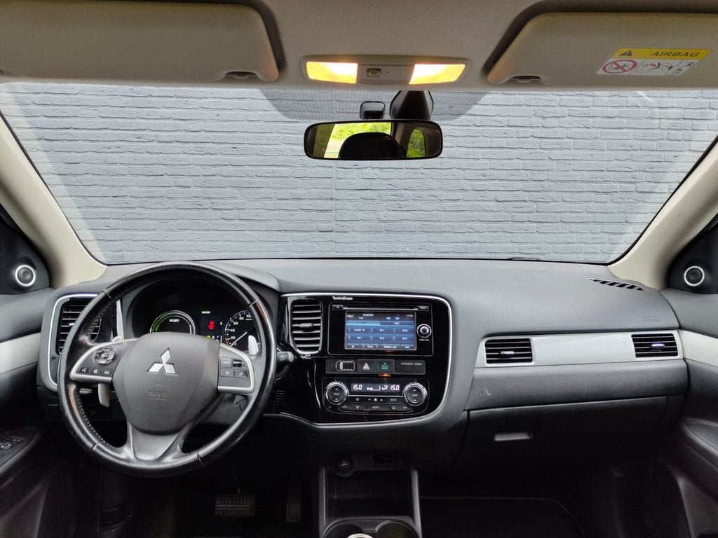 Mitsubishi Outlander 2.0i PHEV Hybrid 4WD Autom Intense + Tr, Auto's, Mitsubishi, Euro 5, Outlander, Zwart, 4 cilinders