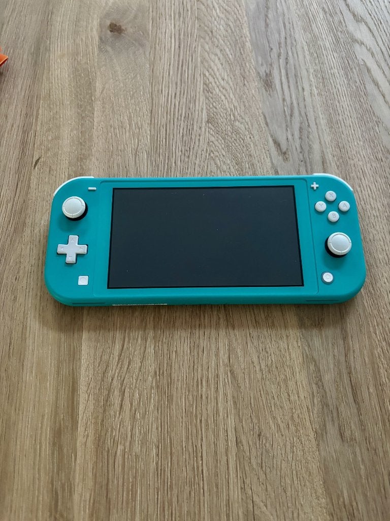 Nintendo Switch Lite, Spelcomputers en Games, Ophalen of Verzenden, Turquoise, Zo goed als nieuw, Met beschermhoes of tas