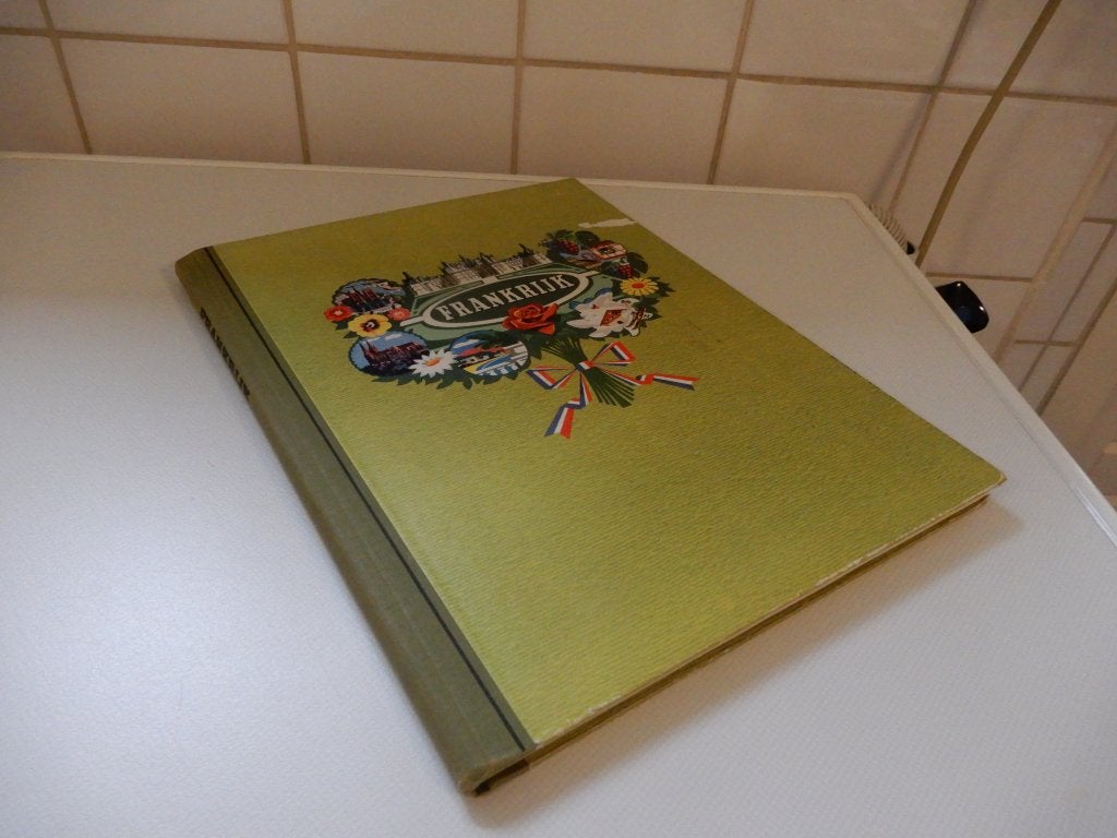 Boek over Frankrijk, oud, met plakplaten, Piet bakker, Ophalen of Verzenden, Gelezen