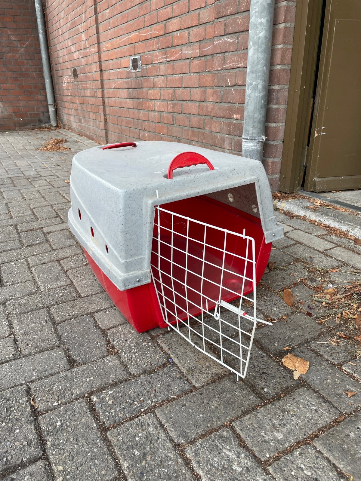 Hondenbench voor middelgrote hond, Ophalen