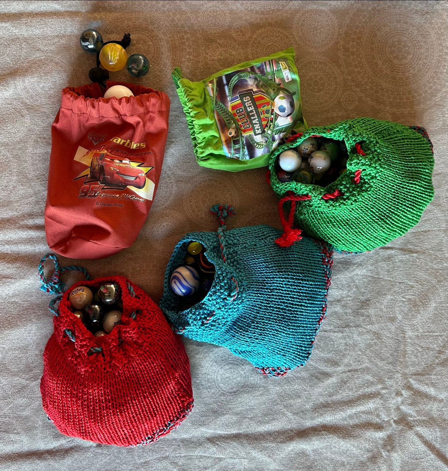 Knikkerzakjes met knikkers - diverse designs, Ophalen of Verzenden, Gebruikt, Jongen of Meisje