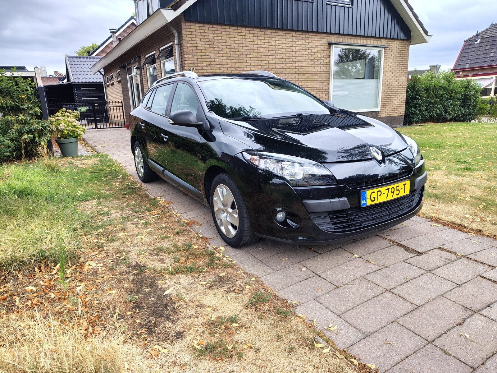 Renault Mégane 1.6 16V 74KW Estate 2012 Zwart, Auto's, 4 cilinders, 100 pk, Zwart, Grijs