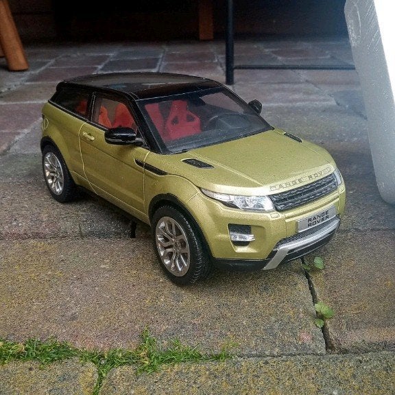 Range Rover Evoque schaalmodel 1/18 - Goud/Zwart, Ophalen of Verzenden, Zo goed als nieuw