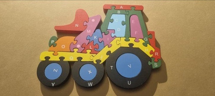 Dubbelzijdige houten puzzel: cijfers en letters, Ophalen of Verzenden, Zo goed als nieuw, Puzzelen