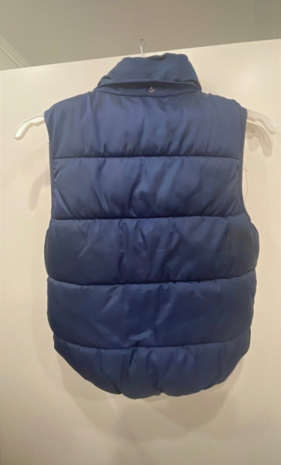 H&M bodywarmer maat 134 donkerblauw nette staat., Ophalen, Zo goed als nieuw, Overige maten, Blauw