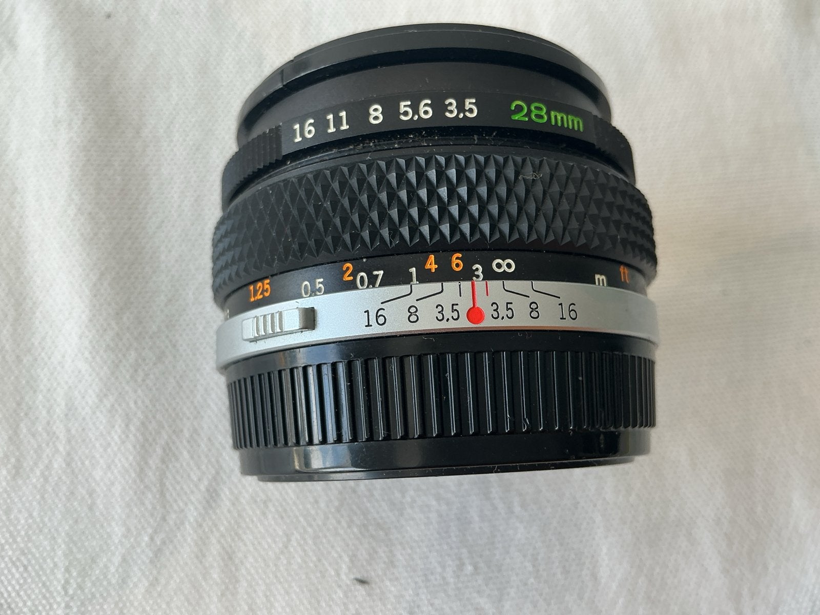 Olympus 28mm lens, Ophalen of Verzenden, Zo goed als nieuw, Groothoeklens