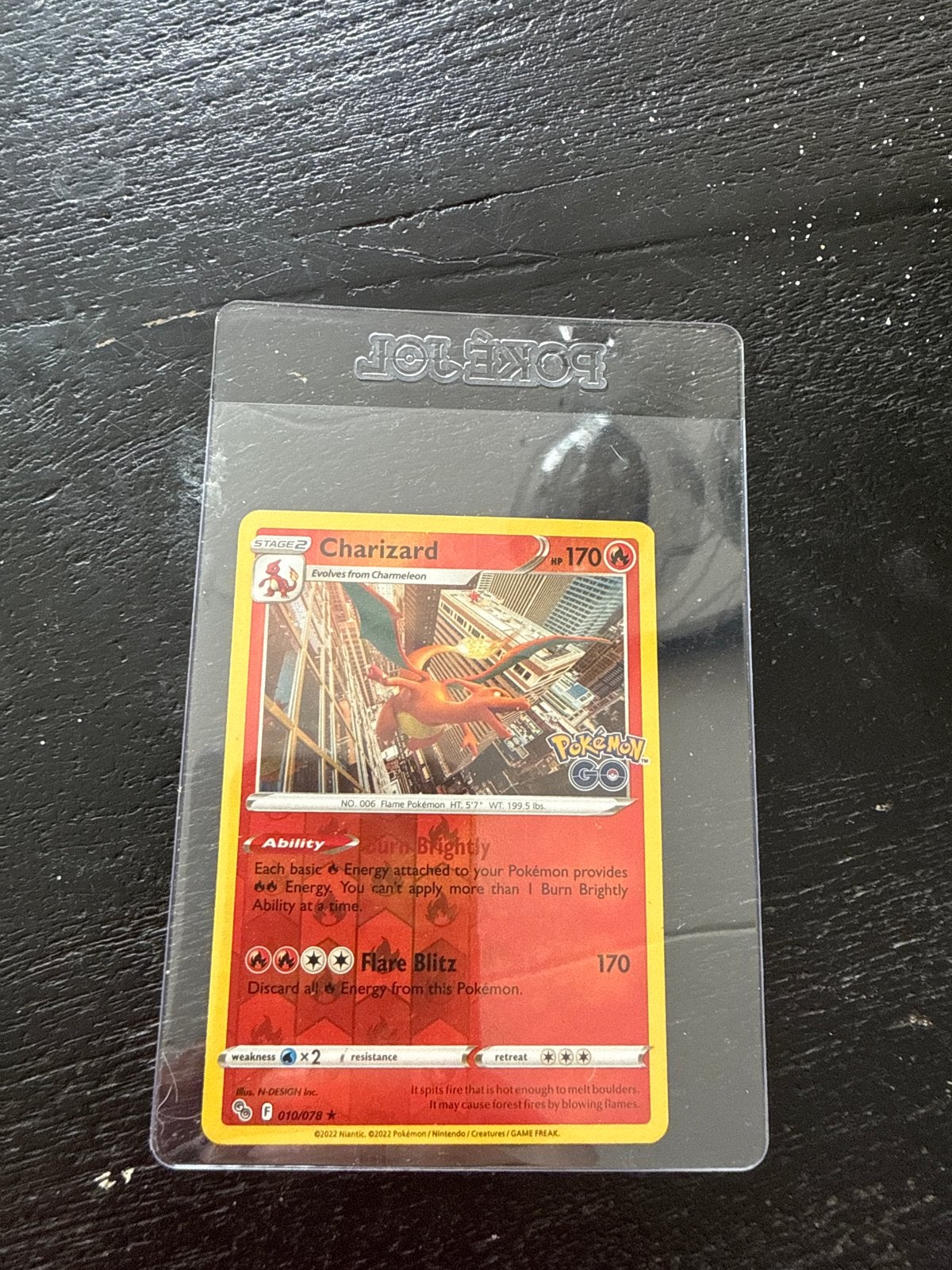 Pokémon GO Charizard 010/078 Holo Rare Kaart, Ophalen of Verzenden, Zo goed als nieuw, Losse kaart