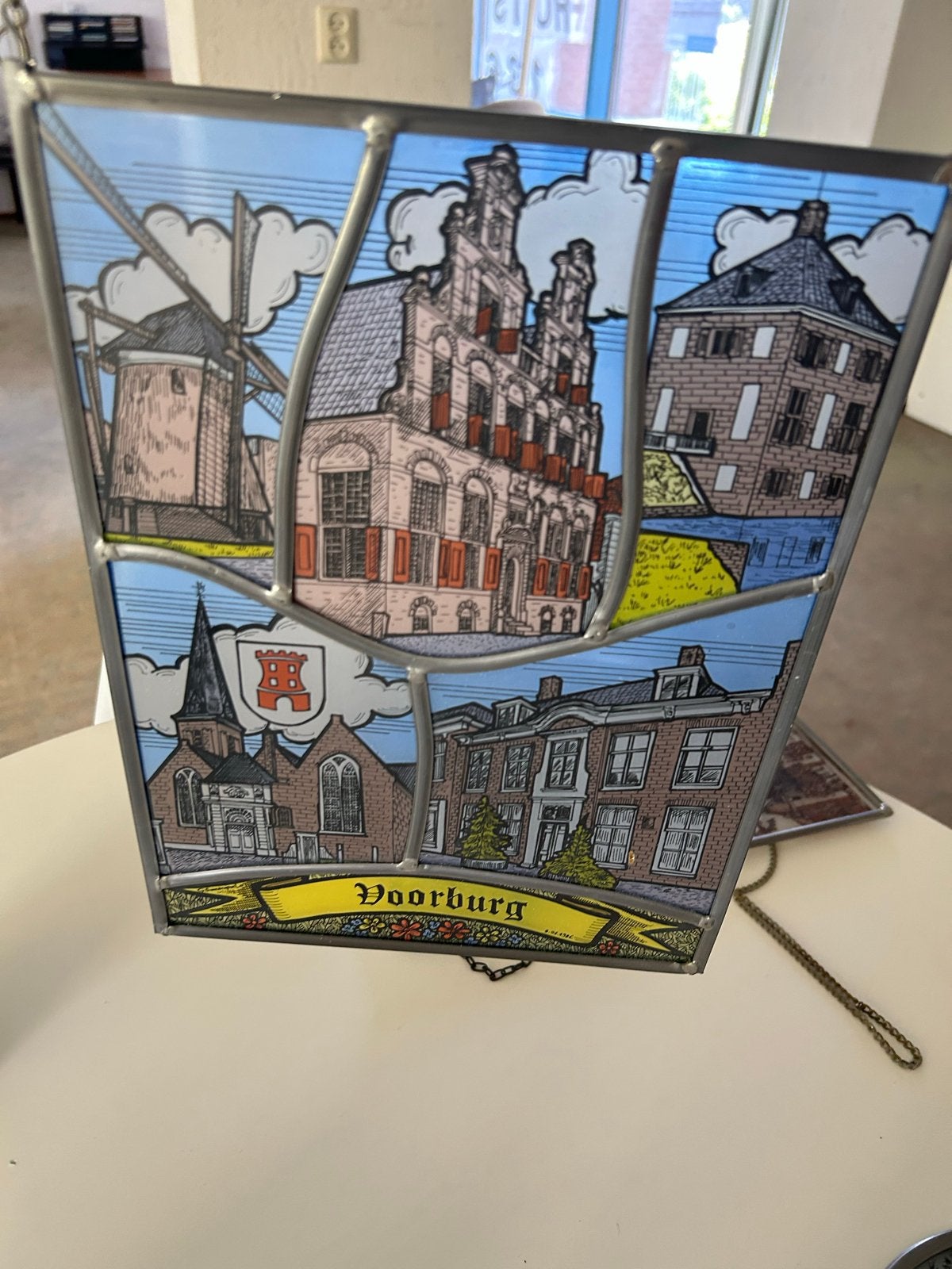 Glas-in-lood hanger Voorburg, Ophalen