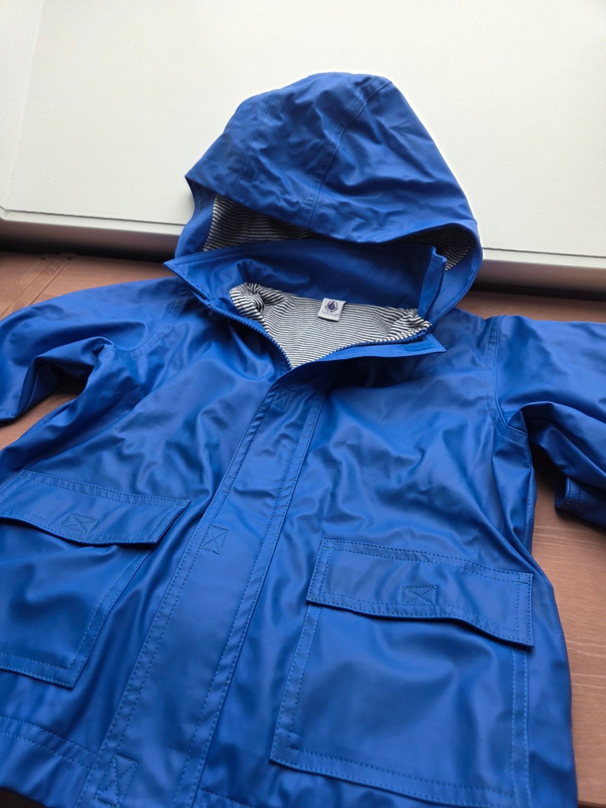 Petit Bateau regenjas blauw - maat 110cm, Ophalen, Zo goed als nieuw, Petit Bateau, Jongen of Meisje