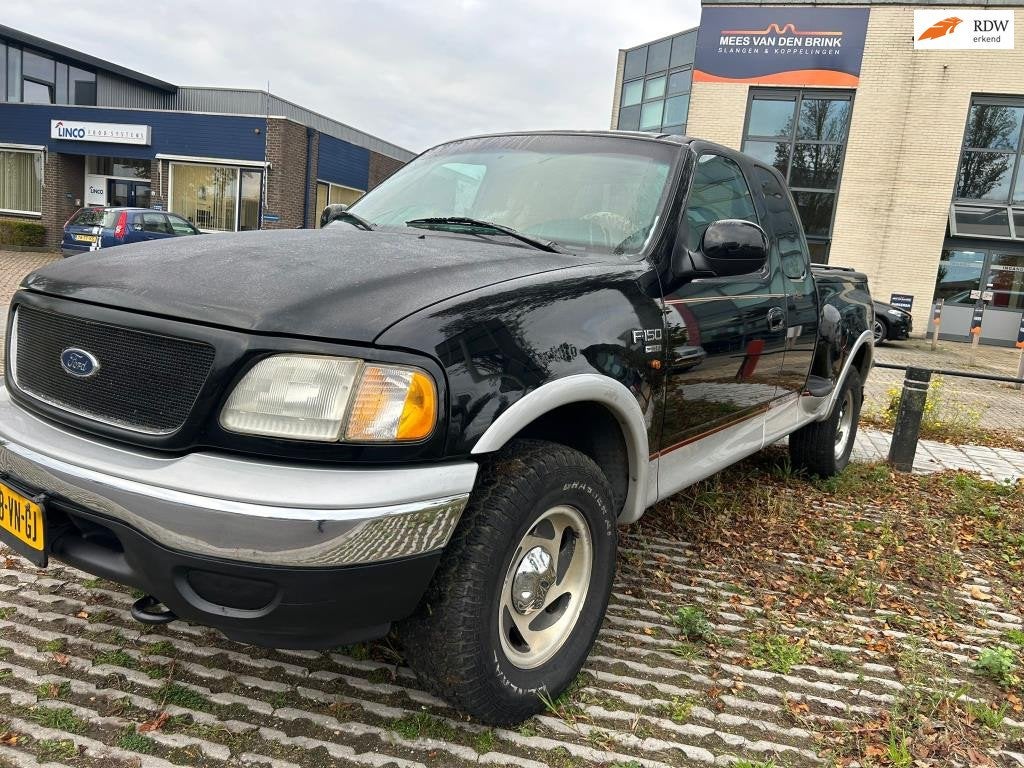 Ford F150 FISO LARIAT SUPER CAB. LPG Bj.2000 met APK tot 20-, Auto's, 450 kg, Gebruikt, F-150, Zwart