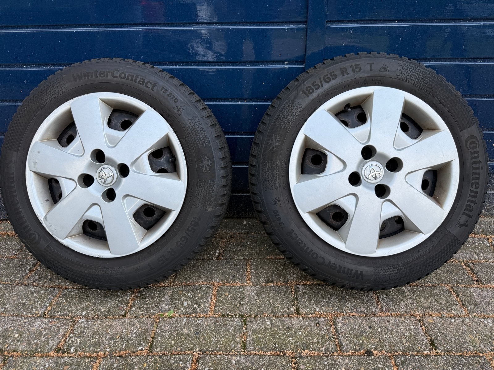 Continental Winterbanden 185/65 R15 op Toyota velgen, Auto-onderdelen, Ophalen, Gebruikt, 15 inch, Banden en Velgen