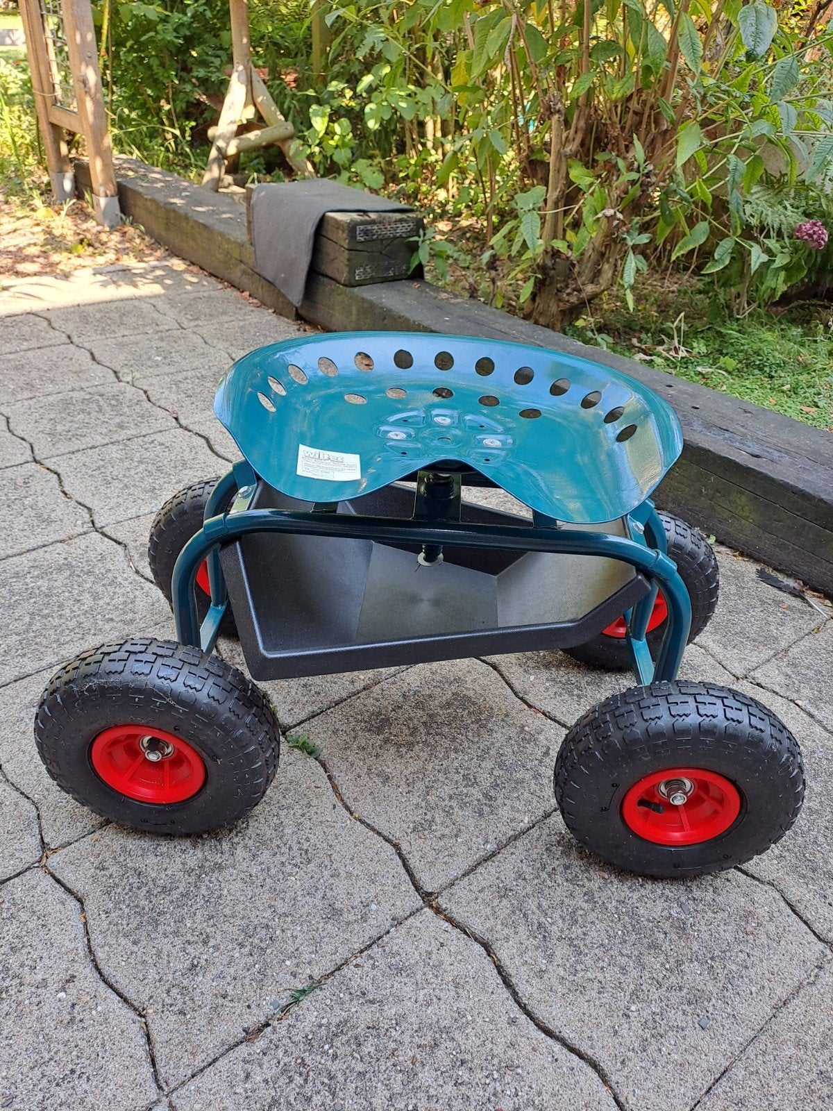 Tuinkruk op wielen met opbergruimte, Ophalen