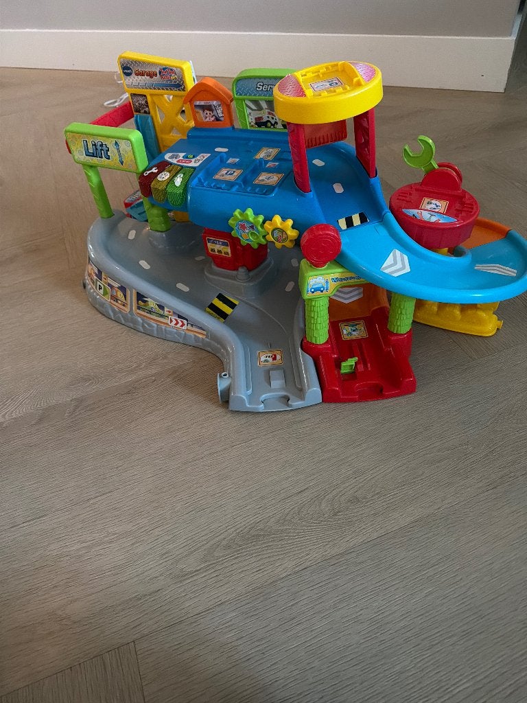 VTech Toet Toet Auto's Garage, Kinderen en Baby's, Speelgoed | Vtech, Ophalen, Zo goed als nieuw, 6 maanden tot 2 jaar