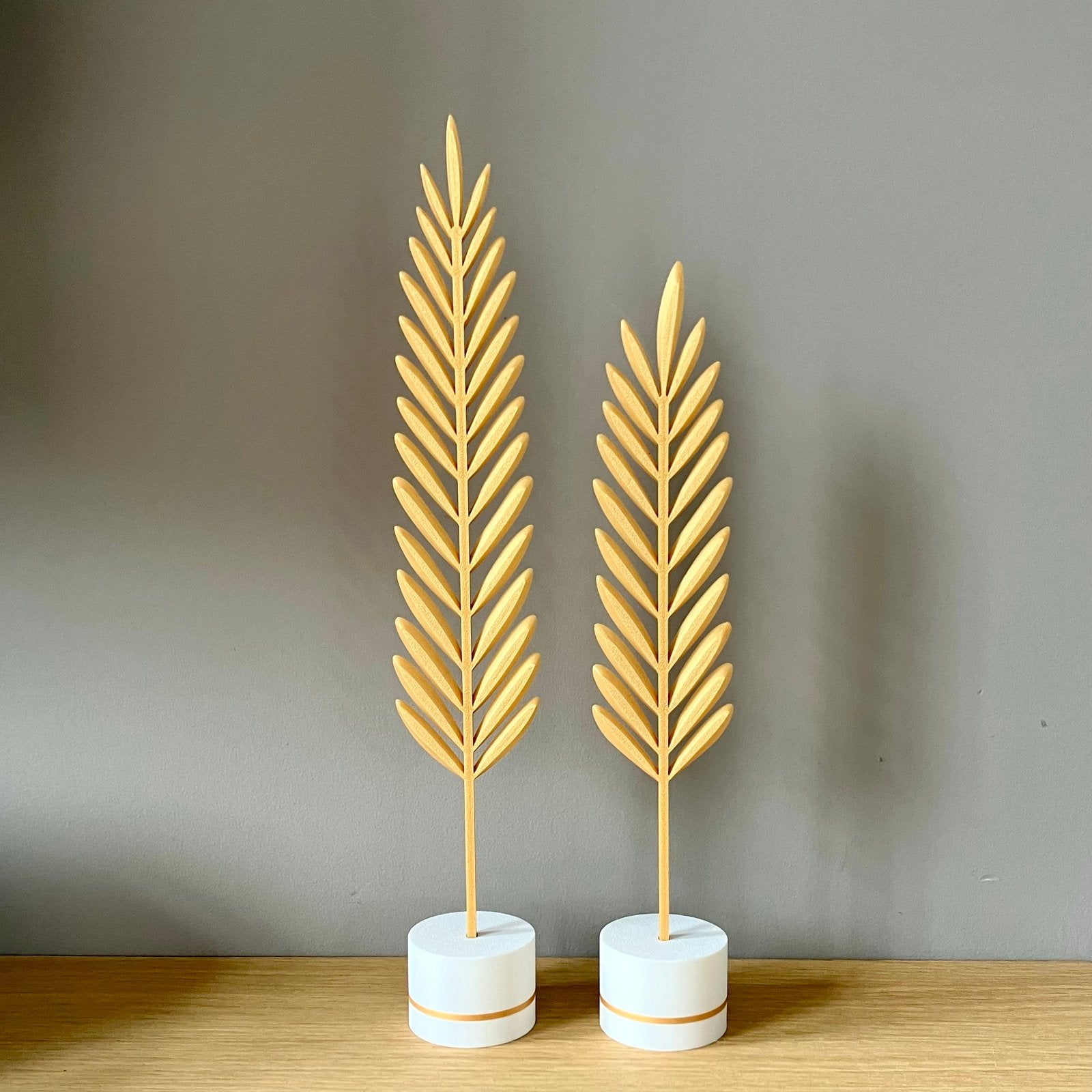 Set van 2 gouden veren op witte standaard, Huis en Inrichting, Woonaccessoires | Overige, Nieuw, Kunststof, Ophalen of Verzenden