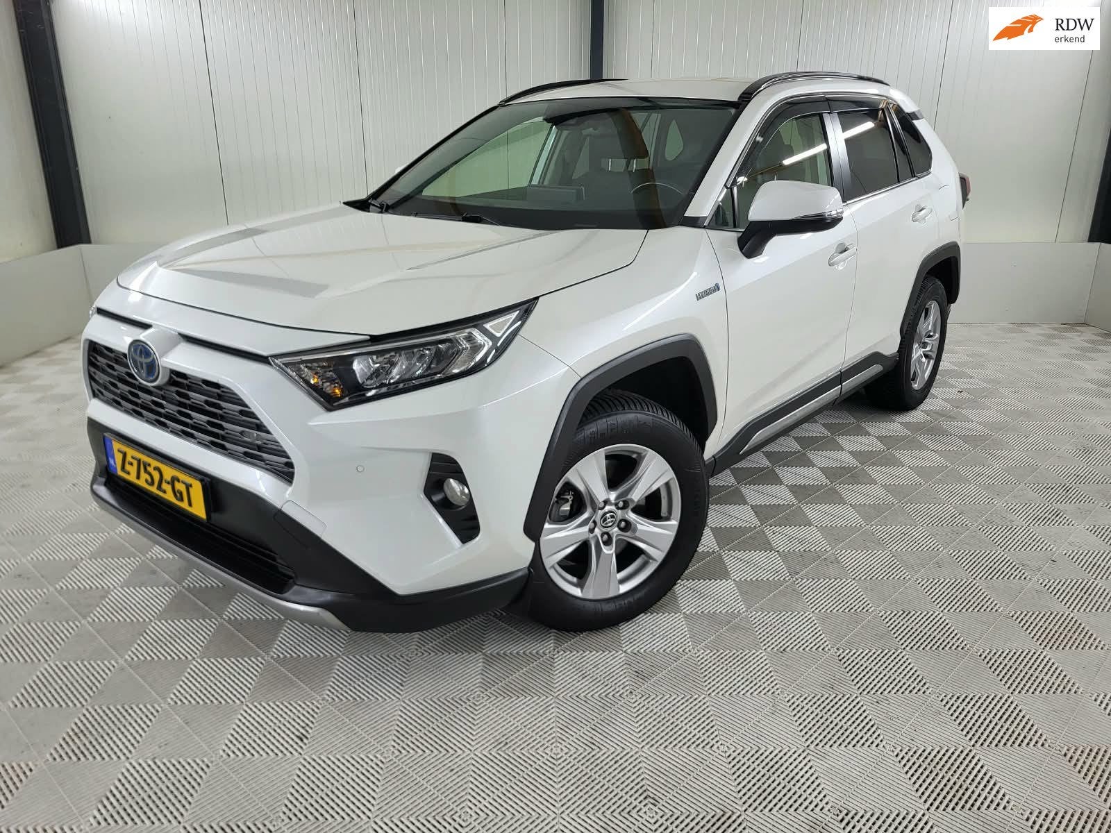 Toyota RAV4 2.5 Hybrid Comfort, Camera, Parelmoer kleur, Auto's, Dealer onderhouden, Stof, Gebruikt, 4 cilinders