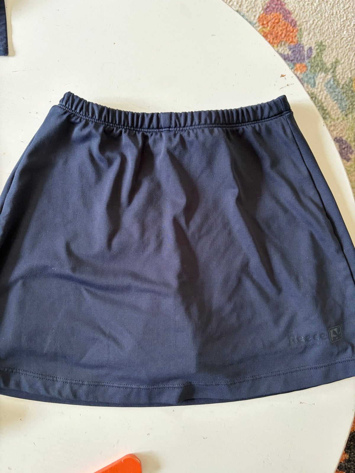 Reece Sportrokje - Donkerblauw - Maat XS en maat 140, Ophalen, Gebruikt, Kleding