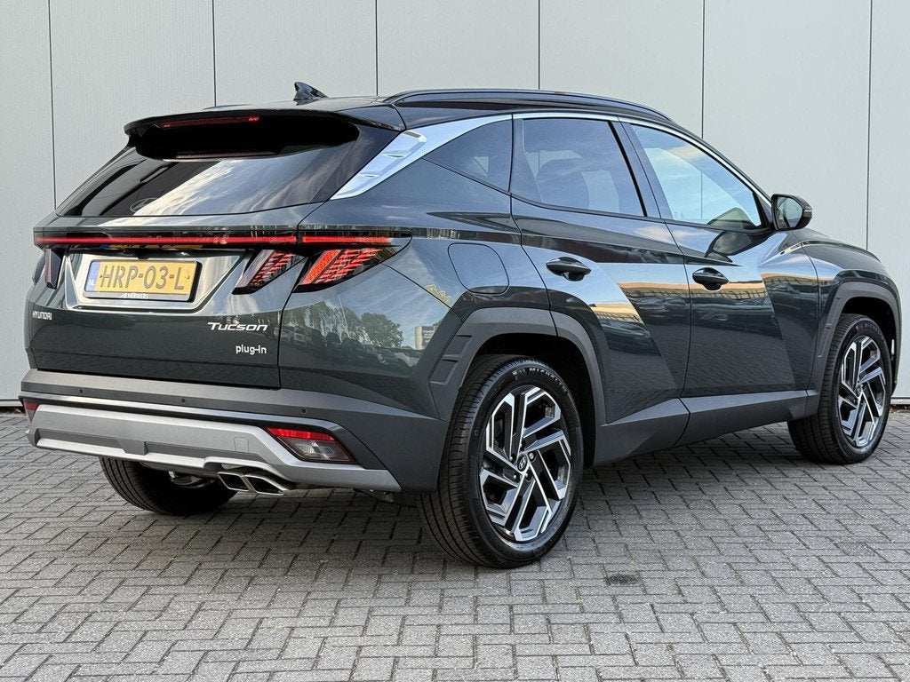 Hyundai Tucson 1.6 T-GDI PHEV Comfort Smart / Two Tone Zwart, Auto's, Hyundai, Euro 6, 4 cilinders, 252 pk, Leder en Stof