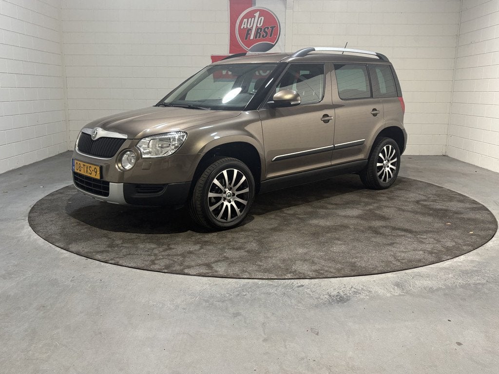Skoda Yeti 1.2 TSI Ambition Arctic NL auto, 1e eigenaar Boek, Auto's, Skoda, Voorwielaandrijving, Euro 5, Stof, Gebruikt