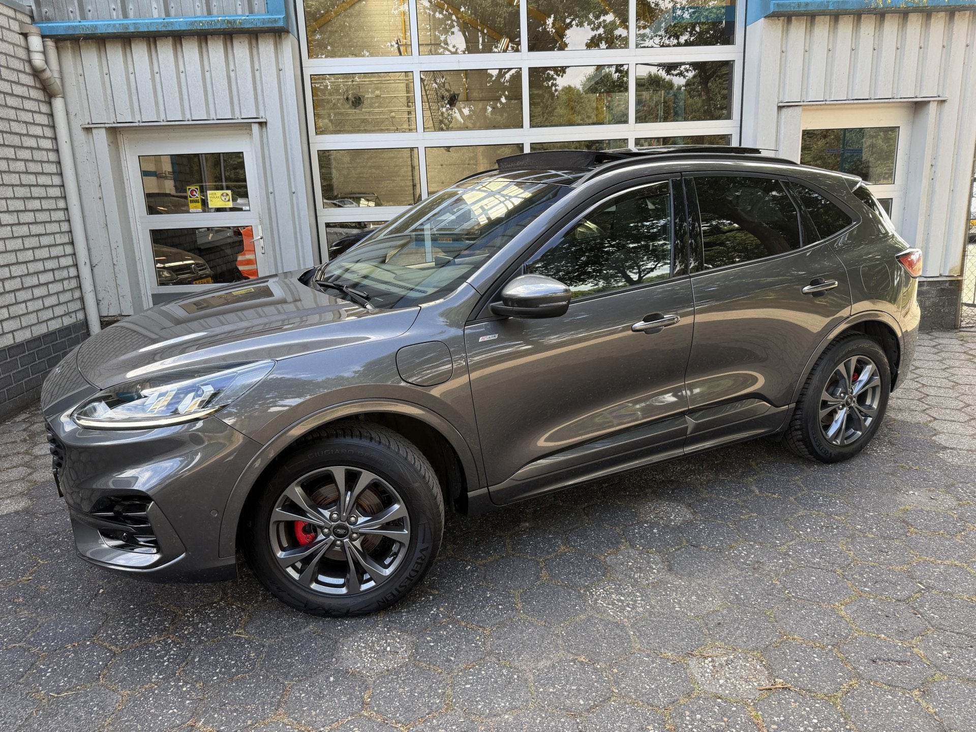 Ford Kuga 2.5 PHEV ST-Line X / Trekhaak/ Panoramadak, Auto's, Ford, Stof, Gebruikt, 4 cilinders, Plug-in hybride