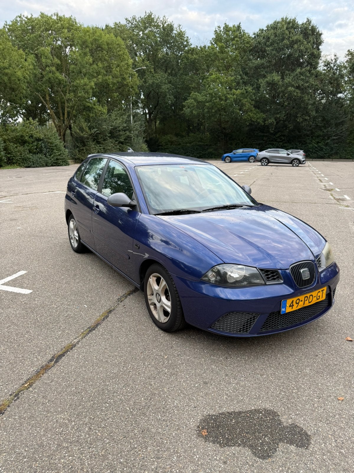 Seat Ibiza 1.4 2004 Blauw appel carplay, Voorwielaandrijving, 15 km/l, 74 pk, Zwart