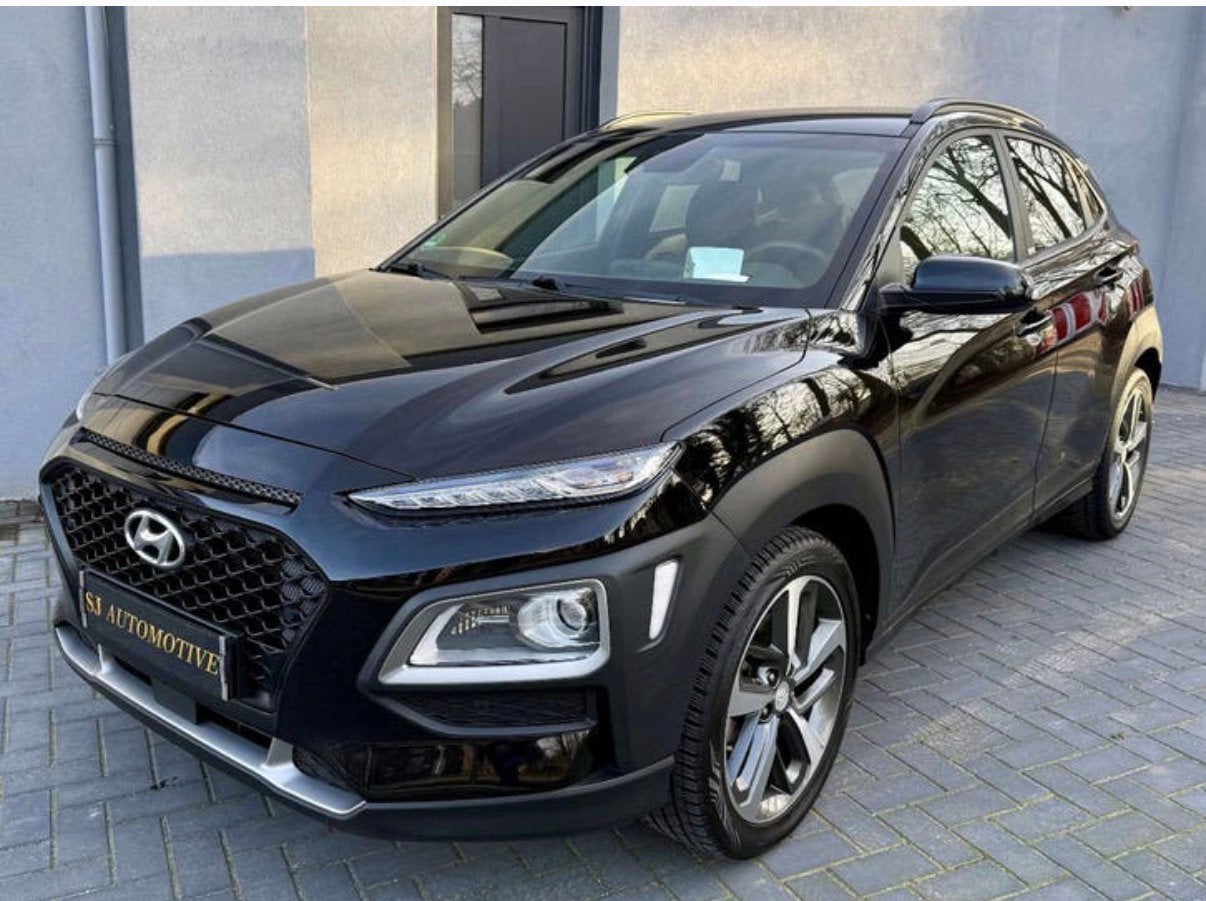 Hyundai Kona 1.0 Tgdi Premium | Head Up | Dealer onderhouden, Auto's, Voorwielaandrijving, Leder en Stof, Zwart, Handgeschakeld