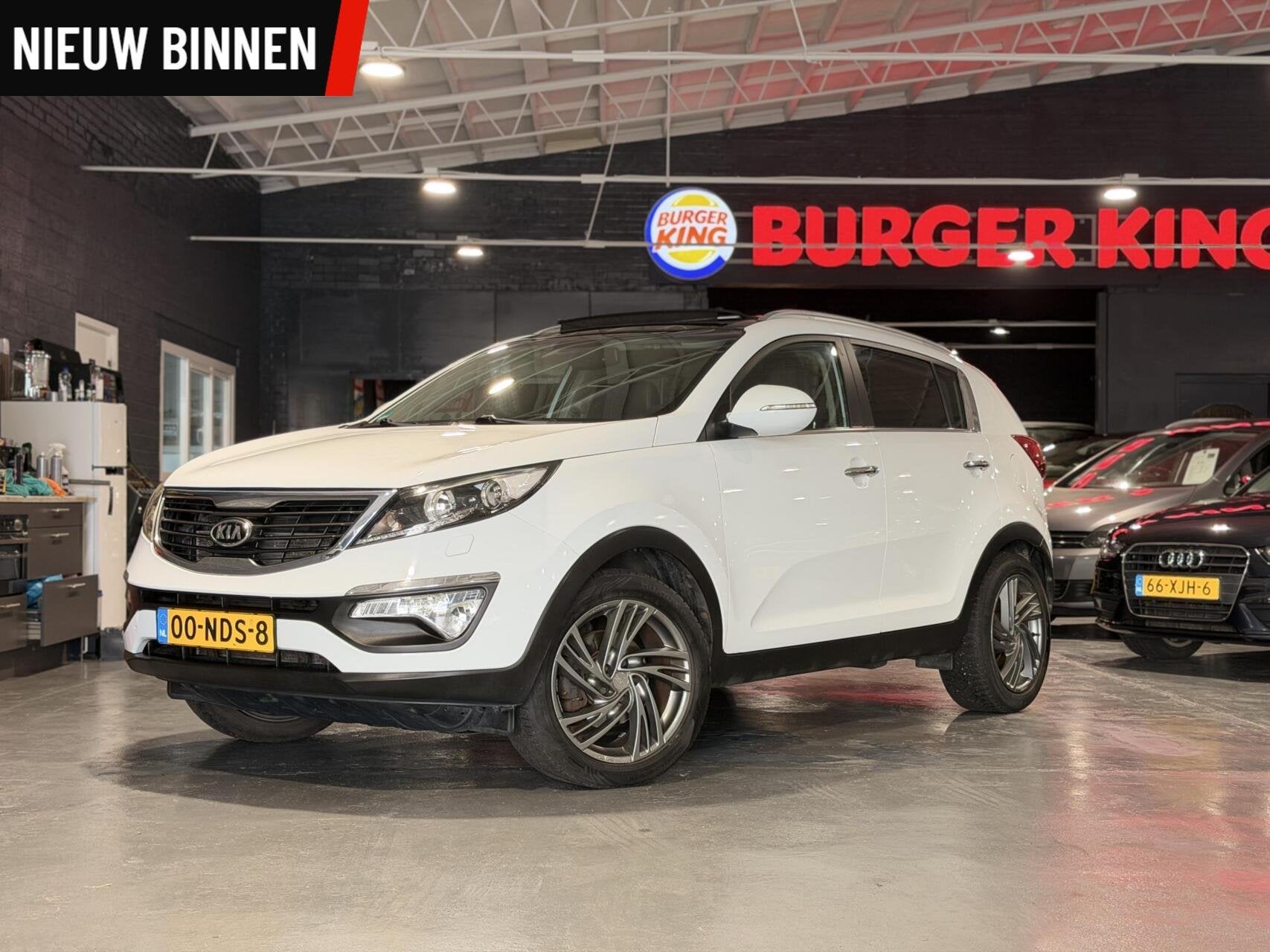 Kia Sportage 2.0 X-clusive First Edition Automaat Airco Pano, Auto's, Gebruikt, 4 cilinders, Xenon verlichting, 1600 kg