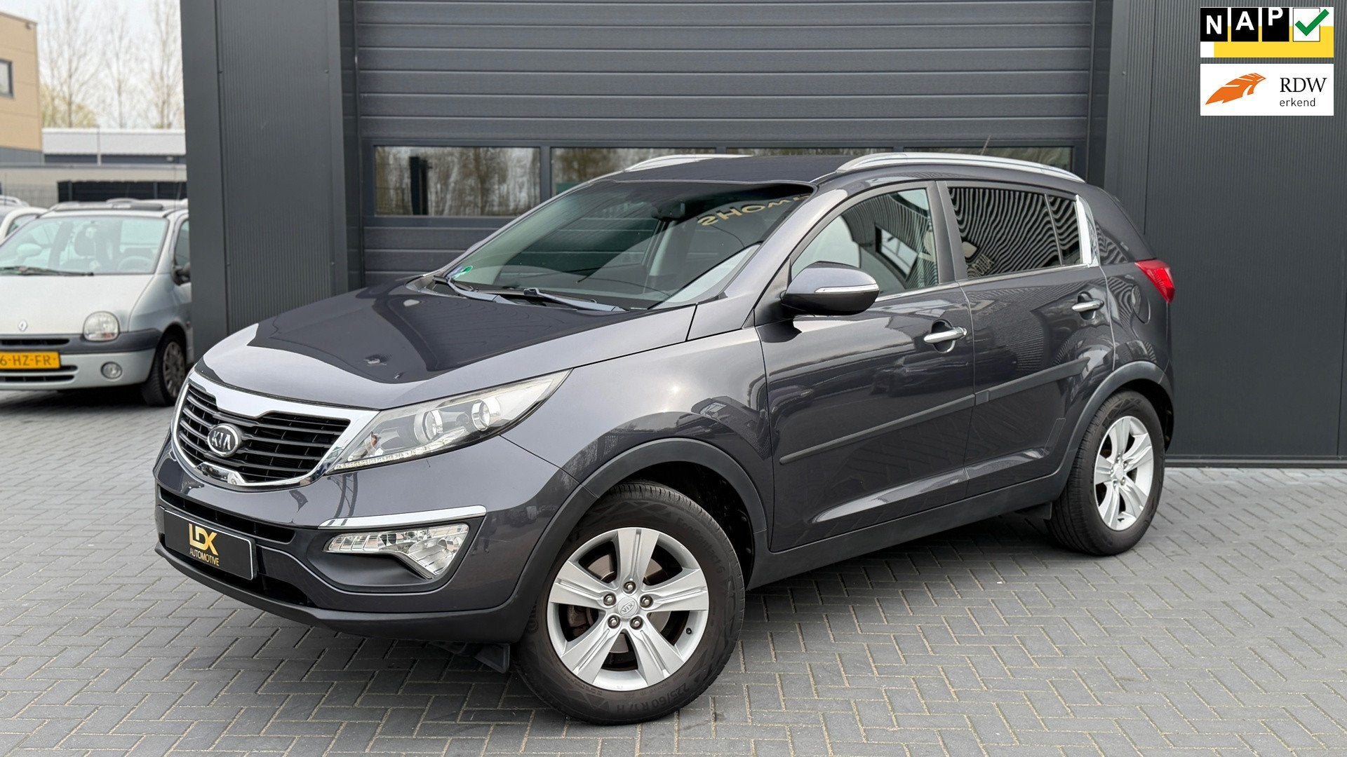 Kia Sportage 2.0 X-ecutive Plus Pack Airco|Trekhaak, Auto's, Gebruikt, 4 cilinders, Leder en Stof, Origineel Nederlands