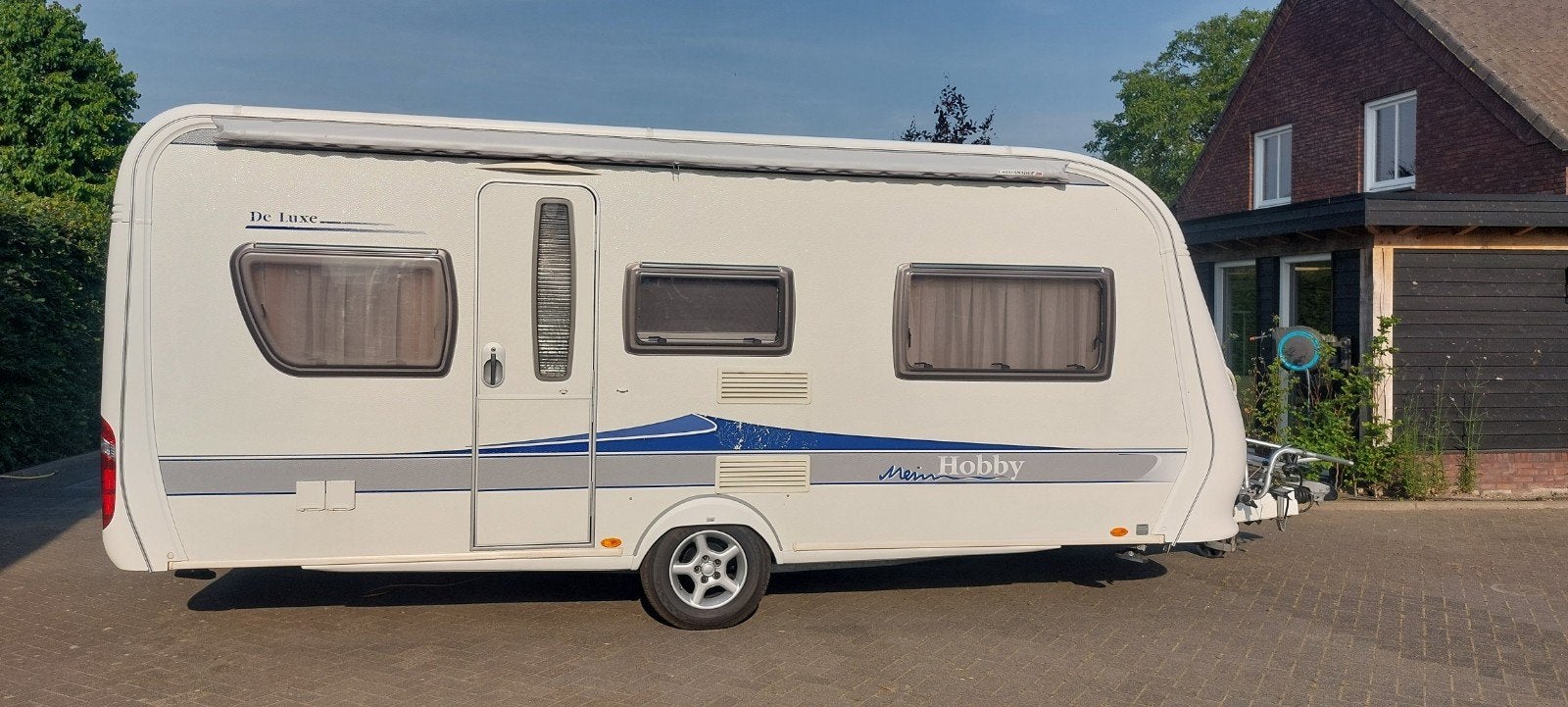 Hobby 495 de Luxe caravan, stapelbed, voortent, zakluifel, Caravans en Kamperen, Caravans, Rondzit, Hobby, Kachel, Dwarsbed
