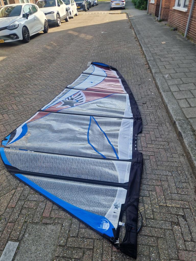 Ezzy Lion 6.0 windsurfzeil met 2 cambers voor RDM mast, Watersport en Boten, Windsurfen, Ophalen of Verzenden, Zeil