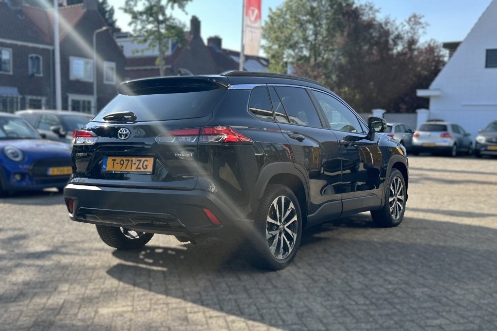 Toyota Corolla Cross 2.0 High Power Hybrid First Edition, Auto's, Toyota, Automaat, Gebruikt, 4 cilinders, Zwart