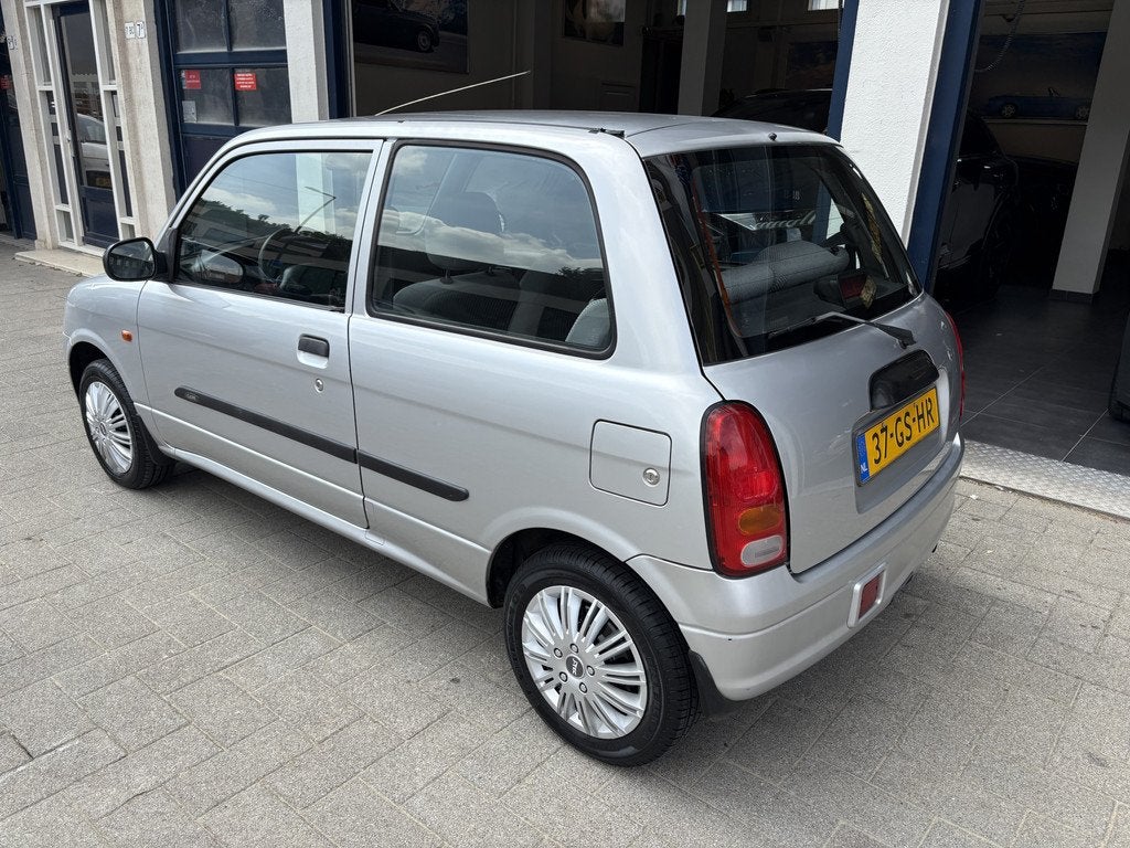 Daihatsu Cuore 1.0-12V XTi AUTOMAAT/NAP/NW APK 06-2027, Auto's, Oldtimers, 15 km/l, 4 stoelen, Origineel Nederlands, Zilver of Grijs